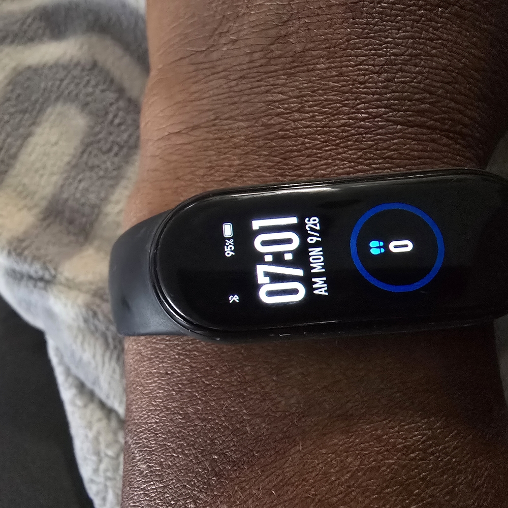 Smart Fitness Tracker with Black Band W/Charge Cable.